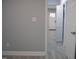 Inviting hallway with fresh paint, leading to the front door and bedrooms at 1210 Shaw St, Burlington, NC 27217
