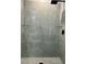 Modern tiled shower with glass shelves and a rainfall shower head at 1210 Shaw St, Burlington, NC 27217