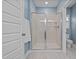 Bathroom featuring a sleek glass shower enclosure with a showerhead and bright tile at 137 Rolling Pasture Way, Sanford, NC 27332