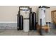 Water filtration and heating system installed in garage at 1716 Ferrell Meadows Dr, Zebulon, NC 27597