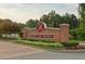 Beautiful brick entrance to the Belmont Lake Preserve community with manicured landscaping at 172 Great Gln, Rocky Mount, NC 27804