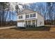 Charming two-story home with stone accents, a two-car garage, and a well-manicured front yard at 172 Great Gln, Rocky Mount, NC 27804