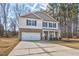 Charming two-story home with a stone-accented facade, attached garage, and a well-manicured front yard at 172 Great Gln, Rocky Mount, NC 27804