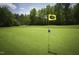 Scenic view of the golf course showcasing its well-maintained green and lush surroundings on a clear day at 172 Great Gln, Rocky Mount, NC 27804