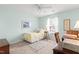 Cozy bedroom with carpet, a ceiling fan, and natural light creates a peaceful atmosphere at 1906 Holly Knoll Ln, Fuquay Varina, NC 27526