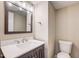 Elegant bathroom with a modern vanity and classic fixtures at 207 Wyatts Pond Ln, Cary, NC 27513