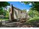 The home's back exterior has a back porch, siding, and a well-kept yard at 207 Wyatts Pond Ln, Cary, NC 27513