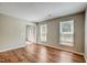 Bright living room with hardwood floors and windows allowing natural light to flow in at 207 Wyatts Pond Ln, Cary, NC 27513