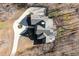 An aerial shot of the house with a circular driveway, showcasing its location amidst trees and a deck area at 209 Democracy Pl, Apex, NC 27523