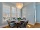 Dining area with shuttered windows provides bright natural light at 209 Democracy Pl, Apex, NC 27523