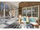 Spacious screened porch with comfortable seating, perfect for enjoying the outdoors at 209 Democracy Pl, Apex, NC 27523