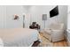 Bedroom with a large chair and a home office setup at 227 Beech Slope Ct, Chapel Hill, NC 27517