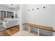 Entryway with wood bench, coat hooks, and access to living space at 227 Beech Slope Ct, Chapel Hill, NC 27517