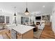 Open concept with eat-in kitchen, dining area and open-concept living room at 227 Beech Slope Ct, Chapel Hill, NC 27517