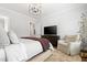 Main bedroom featuring decorative trim, ceiling fan, and natural light at 227 Beech Slope Ct, Chapel Hill, NC 27517