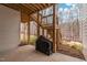 Outdoor patio with stairs leading to upper deck and featuring a grill, ideal for outdoor cooking at 227 Beech Slope Ct, Chapel Hill, NC 27517