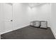 Dedicated pet room with durable flooring and three dog kennels for animal comfort and convenience at 227 Beech Slope Ct, Chapel Hill, NC 27517