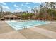 Large community pool with marked lanes and poolside amenities, perfect for recreation and relaxation at 227 Beech Slope Ct, Chapel Hill, NC 27517