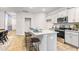 Kitchen with stainless steel appliances, granite countertops, and seating at the kitchen island at 264 Moyer Dr, Graham, NC 27253