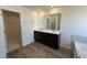 Bathroom with double sink vanity, tile floors, and modern finishes offer a luxurious experience at 2701 Princess Tree Dr, Raleigh, NC 27616