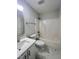 Bright bathroom featuring a new vanity, shower and tub combo with a window at 3 Azzi Ct, Durham, NC 27703