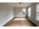 A bedroom with natural light, and neutral walls and flooring at 3 Azzi Ct, Durham, NC 27703