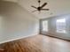 The sunny bedroom offers ample space, neutral walls, and a peaceful atmosphere with hardwood floors at 3 Azzi Ct, Durham, NC 27703