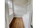 This well-organized walk-in closet features wood floors and functional shelving, maximizing storage space at 3 Azzi Ct, Durham, NC 27703