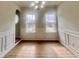 This dining room is a bright space with lots of sunlight, hardwood floors and crisp trim work at 3 Azzi Ct, Durham, NC 27703