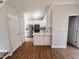 A newly renovated kitchen with stainless steel appliances and white cabinetry at 3 Azzi Ct, Durham, NC 27703