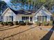 Charming, single-story home featuring a well-manicured lawn and traditional architectural details at 337 Caroline Dr, Wendell, NC 27591