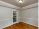 Dining room featuring hardwood floors, neutral paint and bright lighting at 3553 E Jameson Rd, Raleigh, NC 27604