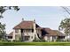 Stunning stone home featuring a beautiful lawn and a detailed wood and stone roof at 364 Brook Green Ln # 29, Pittsboro, NC 27312