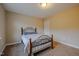 Bedroom with carpet and metal bed frame at 379 Rainmaker St, Linden, NC 28356