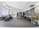 A great open concept kitchen is equipped with stainless appliances, granite countertops, and a social dining area at 400 W North St # 730, Raleigh, NC 27603