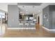 Contemporary kitchen with dark cabinets, stainless steel appliances, and a convenient breakfast bar at 400 W North St # 730, Raleigh, NC 27603