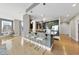 Stylish kitchen with a breakfast bar, modern appliances, and an open layout leading to the living area at 400 W North St # 730, Raleigh, NC 27603