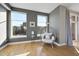 Cozy living area with hardwood floors and an egg chair at 400 W North St # 730, Raleigh, NC 27603
