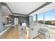 Bright, open living room with large windows offering city views, comfortable seating, and stylish decor at 400 W North St # 730, Raleigh, NC 27603