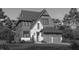 Charming two-story home with a well-manicured lawn, attached garage, and neutral paint scheme at 415 Englewood Dr, Chapel Hill, NC 27514