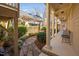 Lush backyard with a stone pathway and pergola offering a tranquil retreat at 43 New Rhododendron, Chapel Hill, NC 27517