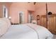 Spacious bedroom showcasing a four-poster bed and high ceilings at 43 New Rhododendron, Chapel Hill, NC 27517
