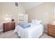 Cozy bedroom with a twin bed, dresser, and light-colored walls at 43 New Rhododendron, Chapel Hill, NC 27517