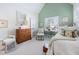 Cozy bedroom with sloped ceilings, a window with shutters and soft natural light at 43 New Rhododendron, Chapel Hill, NC 27517