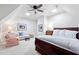 Bright, open bedroom with vaulted ceiling, skylight, and cozy sitting area at 43 New Rhododendron, Chapel Hill, NC 27517