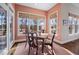 Inviting breakfast nook with large windows offering natural light and views of the yard at 43 New Rhododendron, Chapel Hill, NC 27517