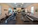 Spacious gym equipped with cardio machines and televisions for community use at 43 New Rhododendron, Chapel Hill, NC 27517