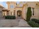 Charming front entrance with stone detailing and manicured landscaping at 43 New Rhododendron, Chapel Hill, NC 27517