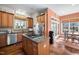 Bright kitchen with stainless steel appliances, granite countertops, and an adjacent breakfast nook at 43 New Rhododendron, Chapel Hill, NC 27517