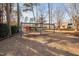 Community playground with swings and playground equipment for outdoor fun at 43 New Rhododendron, Chapel Hill, NC 27517